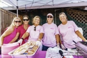 Food booth at the Pink Out with smiling ladies
