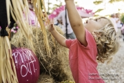 Young child reaching in the air